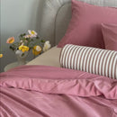 rose corduroy comforter on bed spanning video