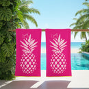 Renee Taylor Jacquard Velour Hearts Beach Towel in bright pink with pineapple heart print.