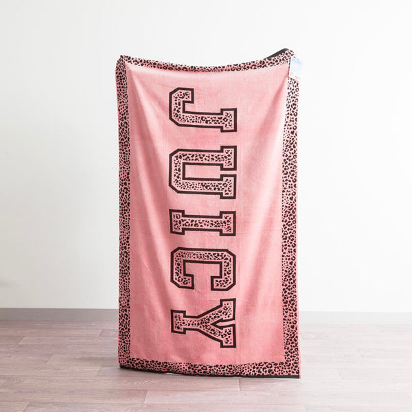 Renee Taylor Jacquard Velour Juicy Couture Beach Towel in blush pink with leopard trim.