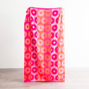 Renee Taylor Jacquard Velour Sunflower Beach Towel with bold pink and orange floral design.