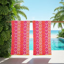 Renee Taylor Jacquard Velour Sunflower Beach Towel with bold pink and orange floral design.