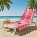 Renee Taylor Jacquard Velour Sunflower Beach Towel with bold pink and orange floral design.