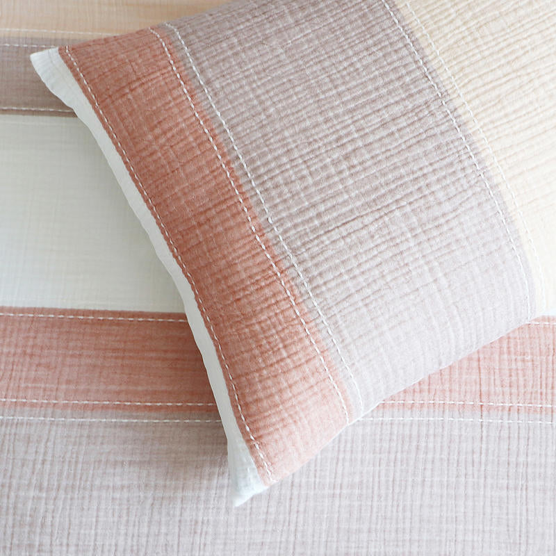 Renee Taylor Bayley Cotton Quilt Cover Set styled with neutral throw and natural decor.