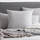 Styled bed featuring Renee Taylor Charcoal European Pillowcase with matching jersey bedding.