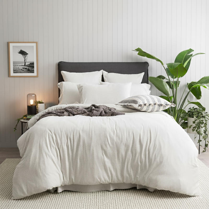 Styled bed featuring Renee Taylor Ecru European Pillowcase with matching organic cotton jersey bedding.