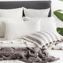 Styled bed featuring Renee Taylor Ecru European Pillowcase with matching organic cotton jersey bedding.