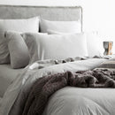 Styled bed featuring Renee Taylor Grey Marle European Pillowcase with matching jersey bedding.