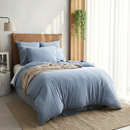 Styled bedroom featuring Renee Taylor Ink European Pillowcase on bed with matching jersey bedding.