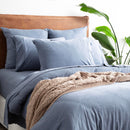 Styled bedroom featuring Renee Taylor Ink European Pillowcase on bed with matching jersey bedding.