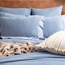 Styled bedroom featuring Renee Taylor Ink European Pillowcase on bed with matching jersey bedding.