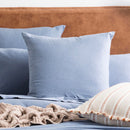 Styled bedroom featuring Renee Taylor Ink European Pillowcase on bed with matching jersey bedding.