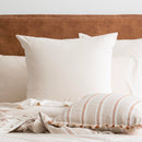 Styled bed featuring Renee Taylor Oatmeal European Pillowcase with matching jersey bedding.