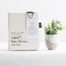 Styled bed featuring Renee Taylor Oatmeal European Pillowcase with matching jersey bedding.