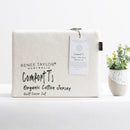 Cosy bedroom scene featuring the Renee Taylor Oatmeal Quilt Cover Set with matching pillowcases.