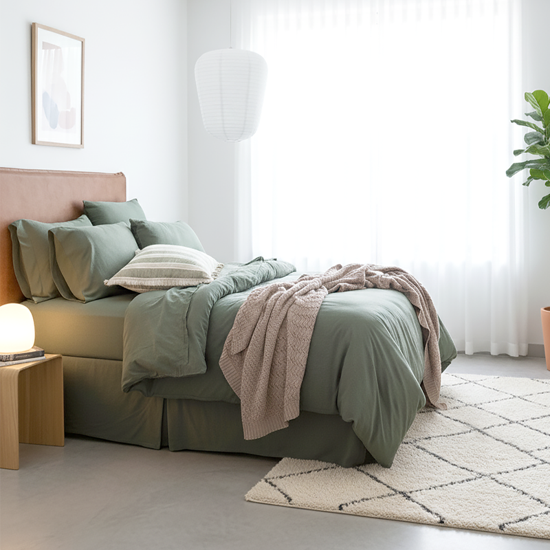 Styled bedroom featuring Renee Taylor Olive European Pillowcase with matching jersey bedding.