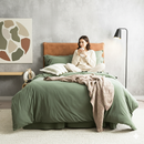 Styled bedroom featuring Renee Taylor Olive European Pillowcase with matching jersey bedding.