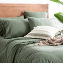 Bedroom styled with Renee Taylor Organic Cotton Jersey Quilt Cover in Olive.