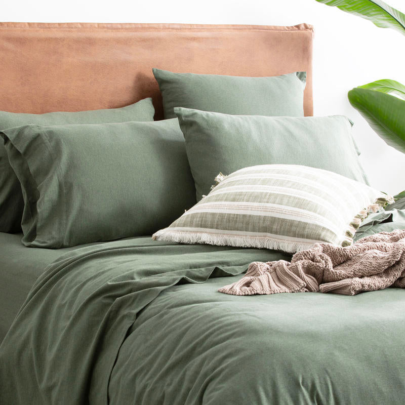 Bedroom styled with Renee Taylor Organic Cotton Jersey Quilt Cover in Olive.
