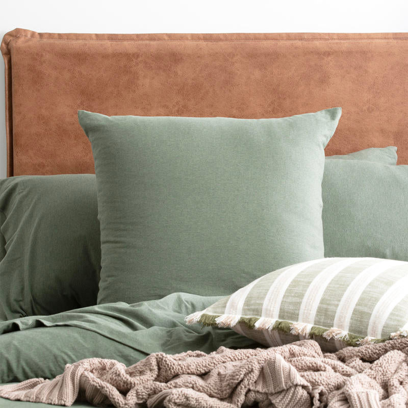 Bedroom styled with Renee Taylor Organic Cotton Jersey Quilt Cover in Olive.