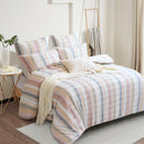 Full bedroom styled with Renee Taylor Layla 100% Cotton Quilt Cover Set in soft pastel stripes.