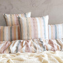Full bedroom styled with Renee Taylor Layla 100% Cotton Quilt Cover Set in soft pastel stripes.