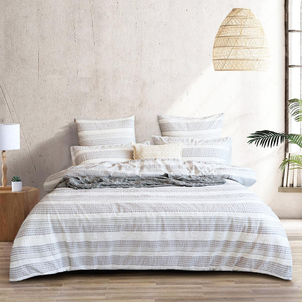 Renee Taylor Lenone Quilt Cover Set paired with light timber furniture for a relaxed, modern look.