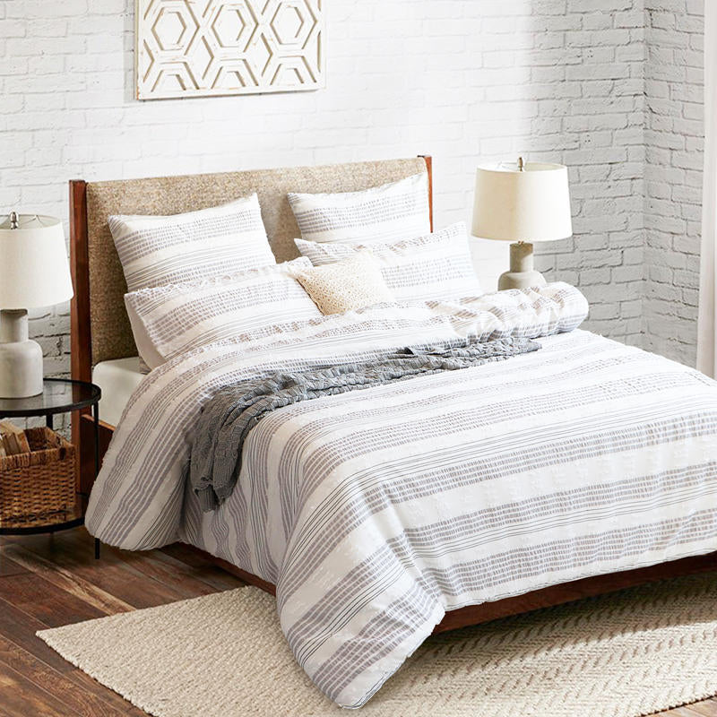 Renee Taylor Lenone Quilt Cover Set paired with light timber furniture for a relaxed, modern look.