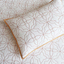 Close-up of intricate quilted detailing on Renee Taylor Solaris Quilt Cover.