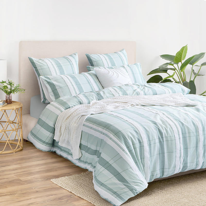 Full styled bedroom featuring Renee Taylor Syracuse Quilt Cover Set in soft green stripes.