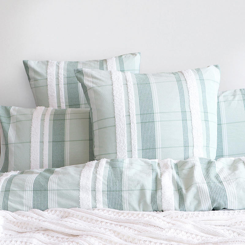 Full styled bedroom featuring Renee Taylor Syracuse Quilt Cover Set in soft green stripes.