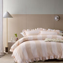 Natural striped cotton quilt cover with ruffle edges and matching pillowcases.
