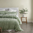 Sage washed cotton quilt cover set with soft textured finish.