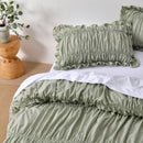 Sage washed cotton quilt cover set with soft textured finish.