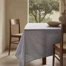 Vintage Design Riveria Stripe Linen Cotton Blue Tablecloth styled in dining setting.