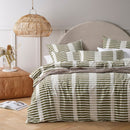 Close-up of Tempo green quilt cover fabric and stripe design.