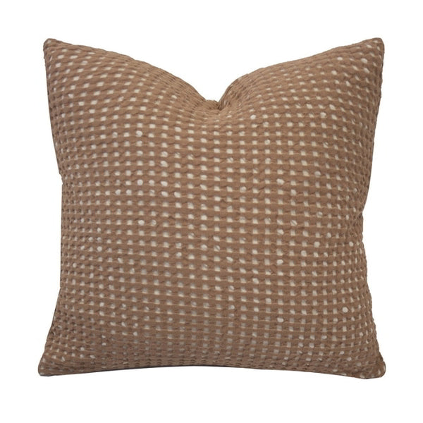 alt="Square cushion in two-tone light and dark brown waffle fabric"