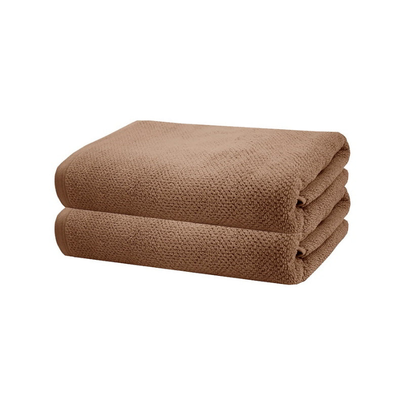 alt="Brown soft cotton bath towels"