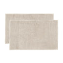 alt="Two beautiful, soft natural cotton bath mats"