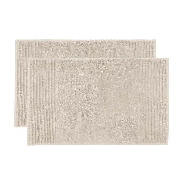 alt="Two beautiful, soft natural cotton bath mats"