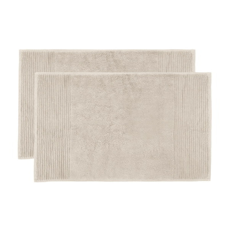 alt="Two beautiful, soft natural cotton bath mats"