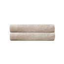 alt="Two beautiful, soft natural cotton bath towels"