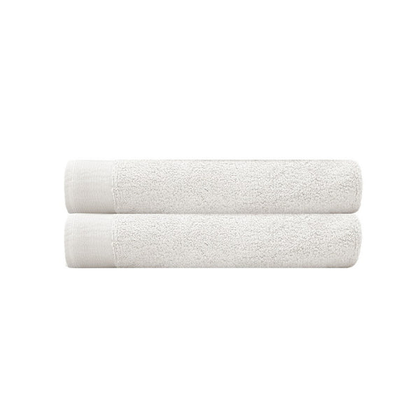 alt="Two beautiful, soft ivory cotton bath towels"