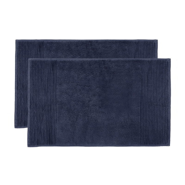 alt="Two beautiful, soft navy cotton bath mats"