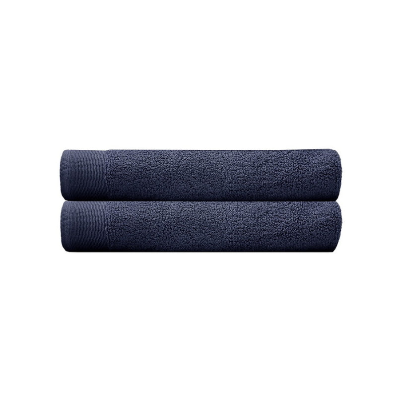 alt="Two beautiful, soft navy cotton bath towels"