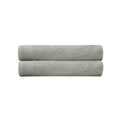 alt="Two beautiful, soft sage green cotton bath towels"