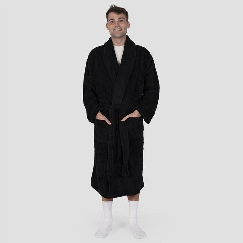 alt="A man standing wearing a microplush black robe"
