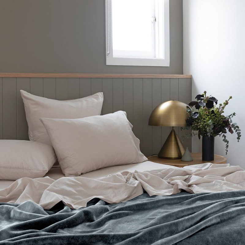 Luxuriously soft blue blanket from Bambury, perfect for adding warmth to your bed or snuggling up while relaxing on the couch.