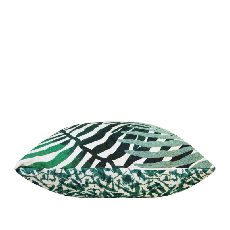 alt="Coastal-inspired cushion showcasing its double-sided foliage design, top-notch print quality, and precise chain-stitched accent detailing."