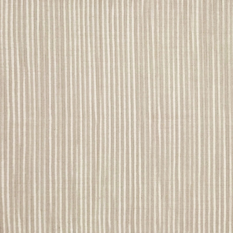 alt="Zoom in details of a cream and white featuring a two-toned ribbed design"