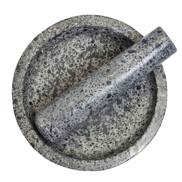 alt="Front details of a mortar and pestle made from dark terrazzo stone"